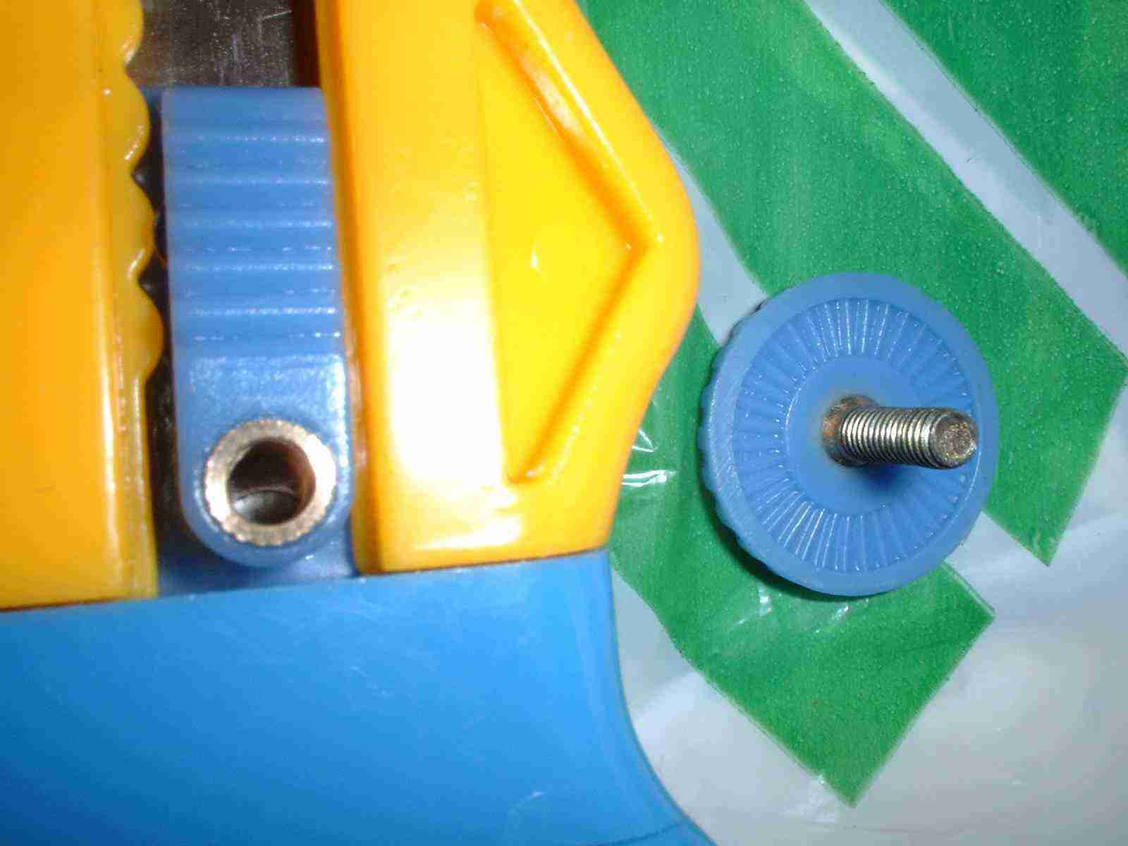 Close-up of a screw-down clamp removed
