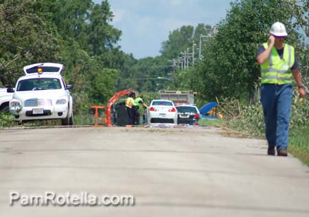 Work crews along Markham Road