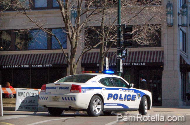 One of the few squad cars blocking off streets going into the square