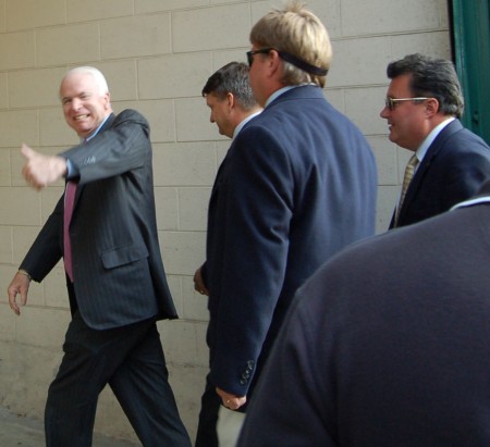 Senator McCain rushes into building, photo by Pam Rotella